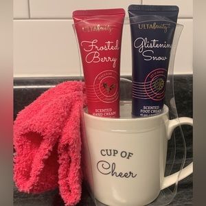 Ulta Beauty hand and foot cream, mug, and fuzzy socks